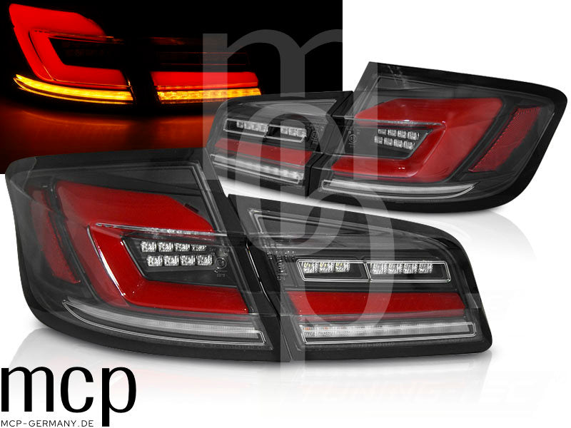 Voll LED Lightbar Rückleuchten Set für BMW 5er F10 Limousine (2010 bis 2016) in Schwarz mit Dynamischem Blinker