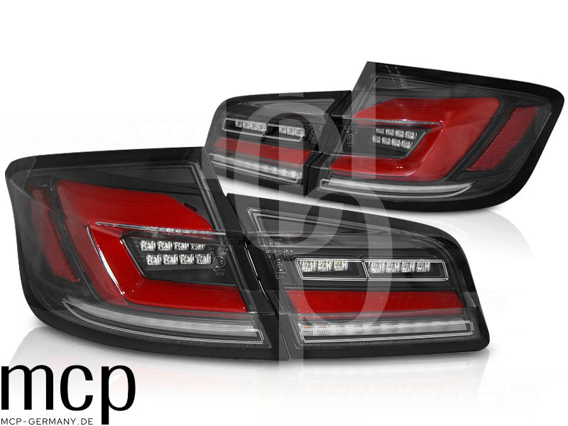Voll LED Lightbar Rückleuchten Set für BMW 5er F10 Limousine (2010 bis 2016) in Schwarz mit Dynamischem Blinker